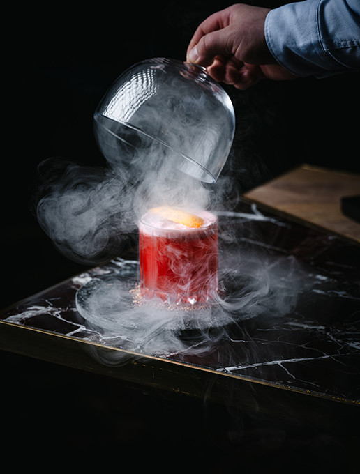 Smoky pink cocktail, served at Dans le Noir ? restaurant