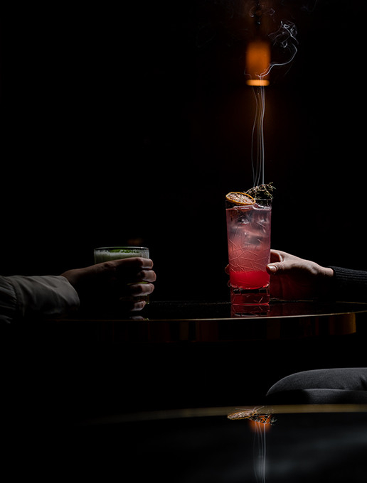 Married couple toasting for their wedding anniversary at Dans le Noir ?